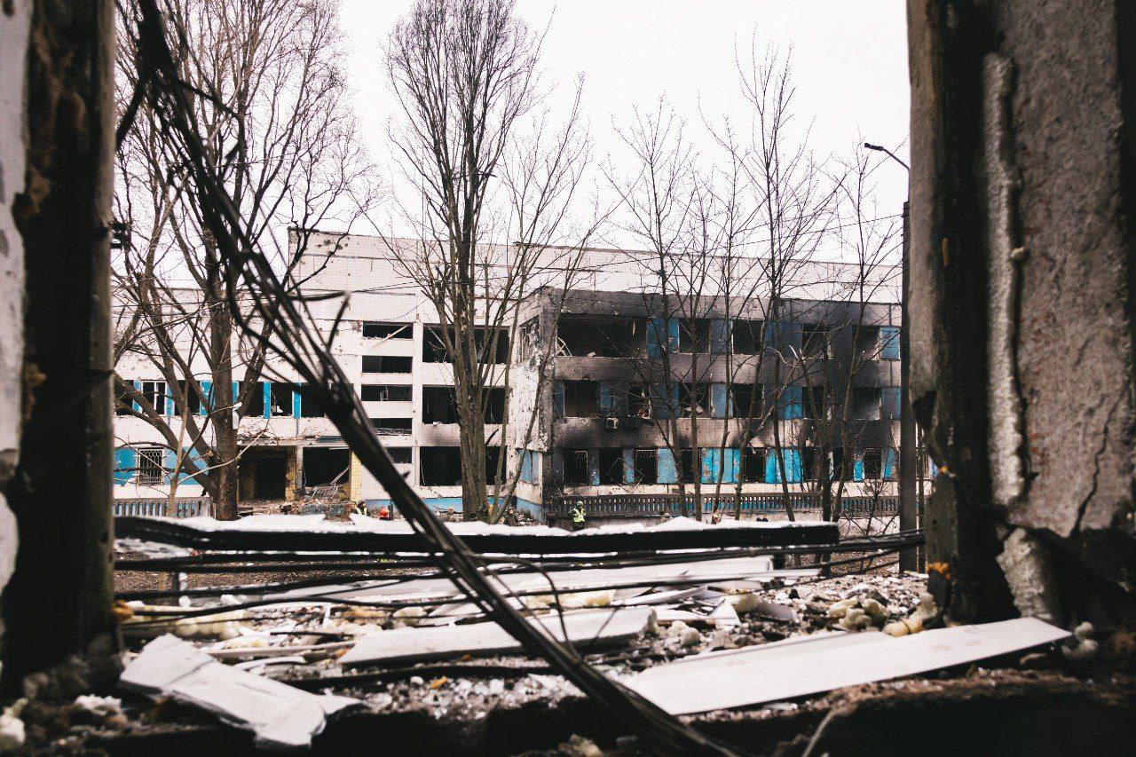 An archival view through a damaged wall towards a maternity hospital struck in Dnipro, Ukraine