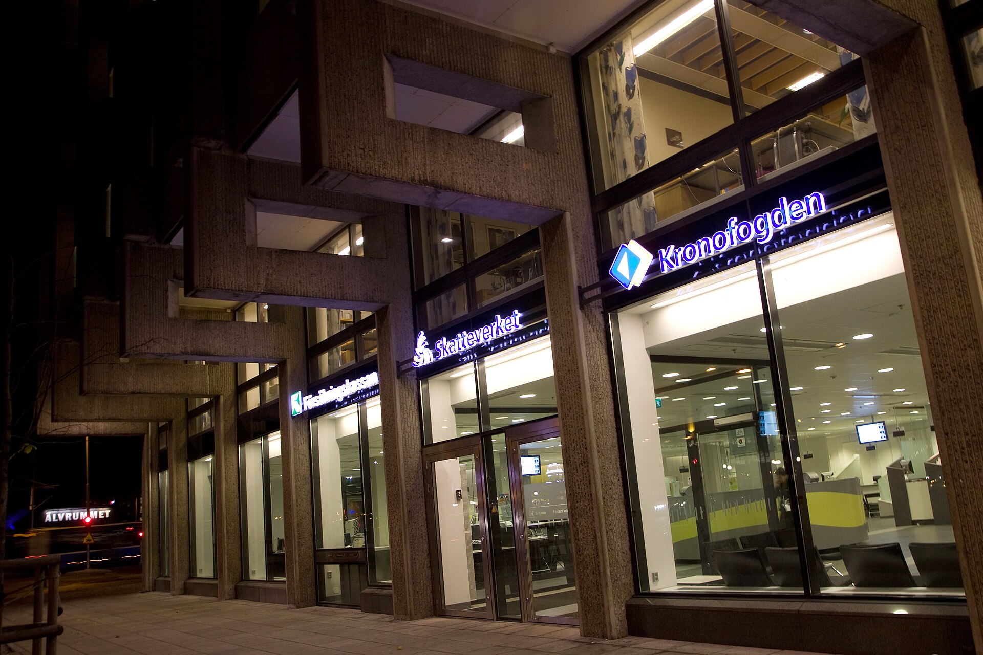 Entrance to a Swedish government service office with Tax Agency and Enforcement Authority signs