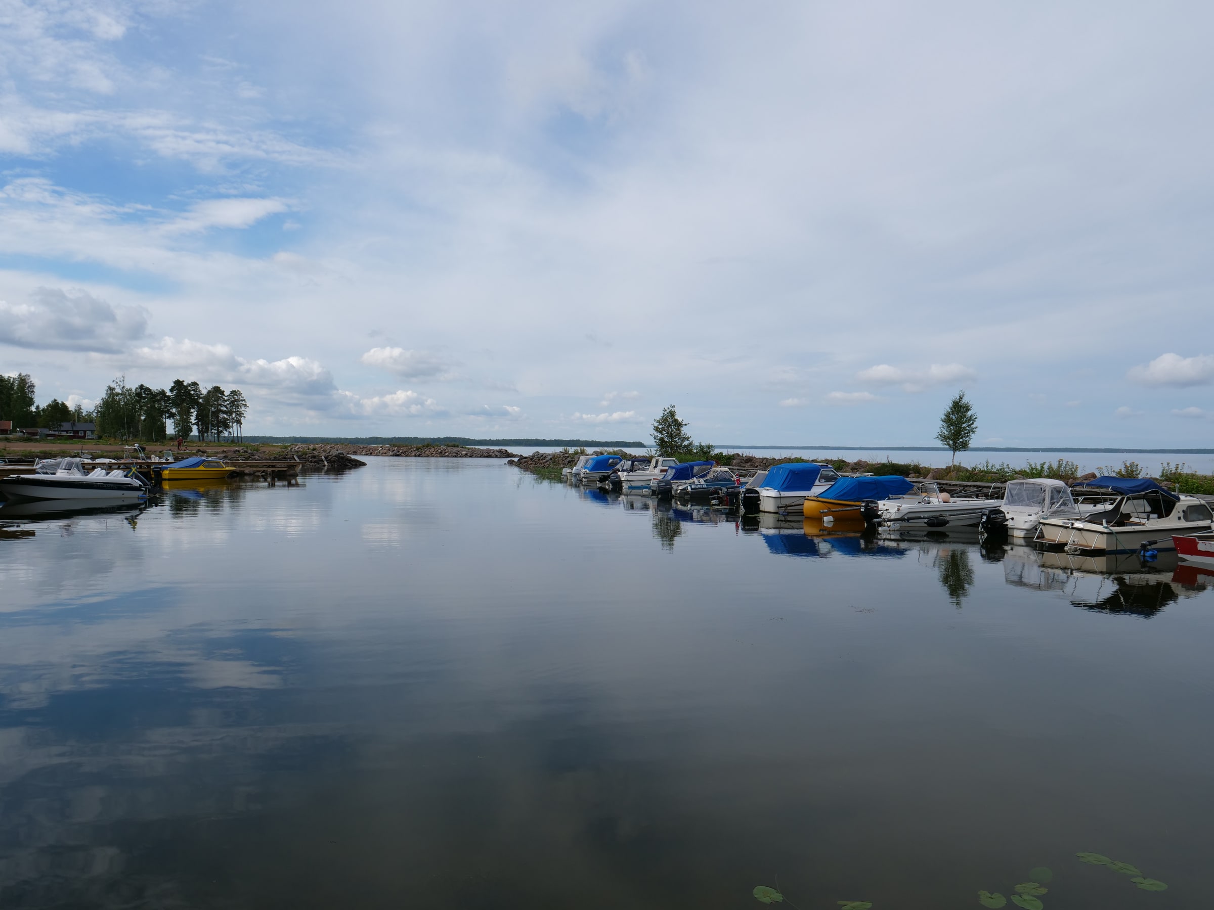 Small boats moored at Askeviksbadets Camping on Lake Vänern, photographed on 3 August 2017.