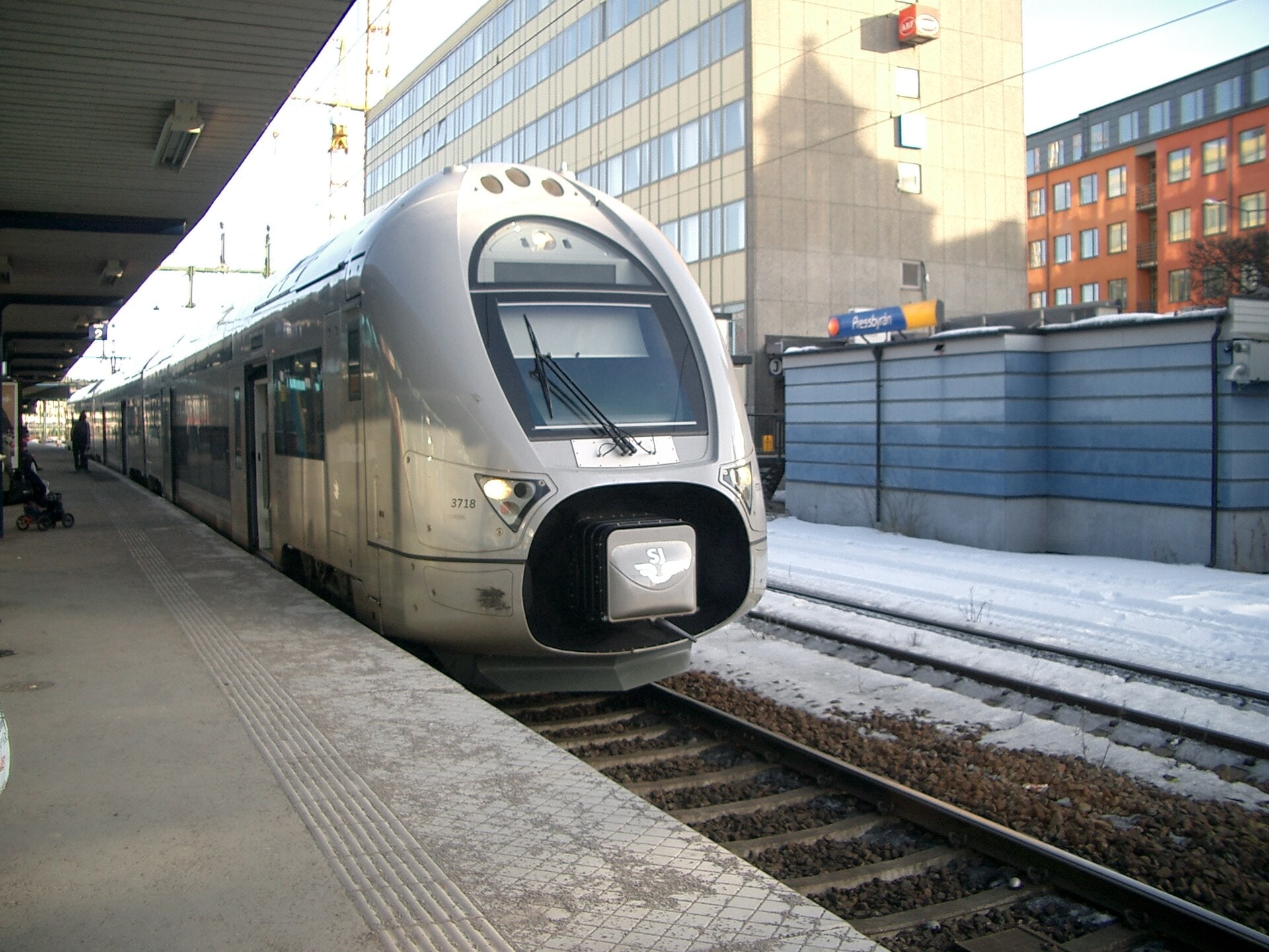 An SJ X40 regional double-decker train stands at Sundbyberg station in March 2006.