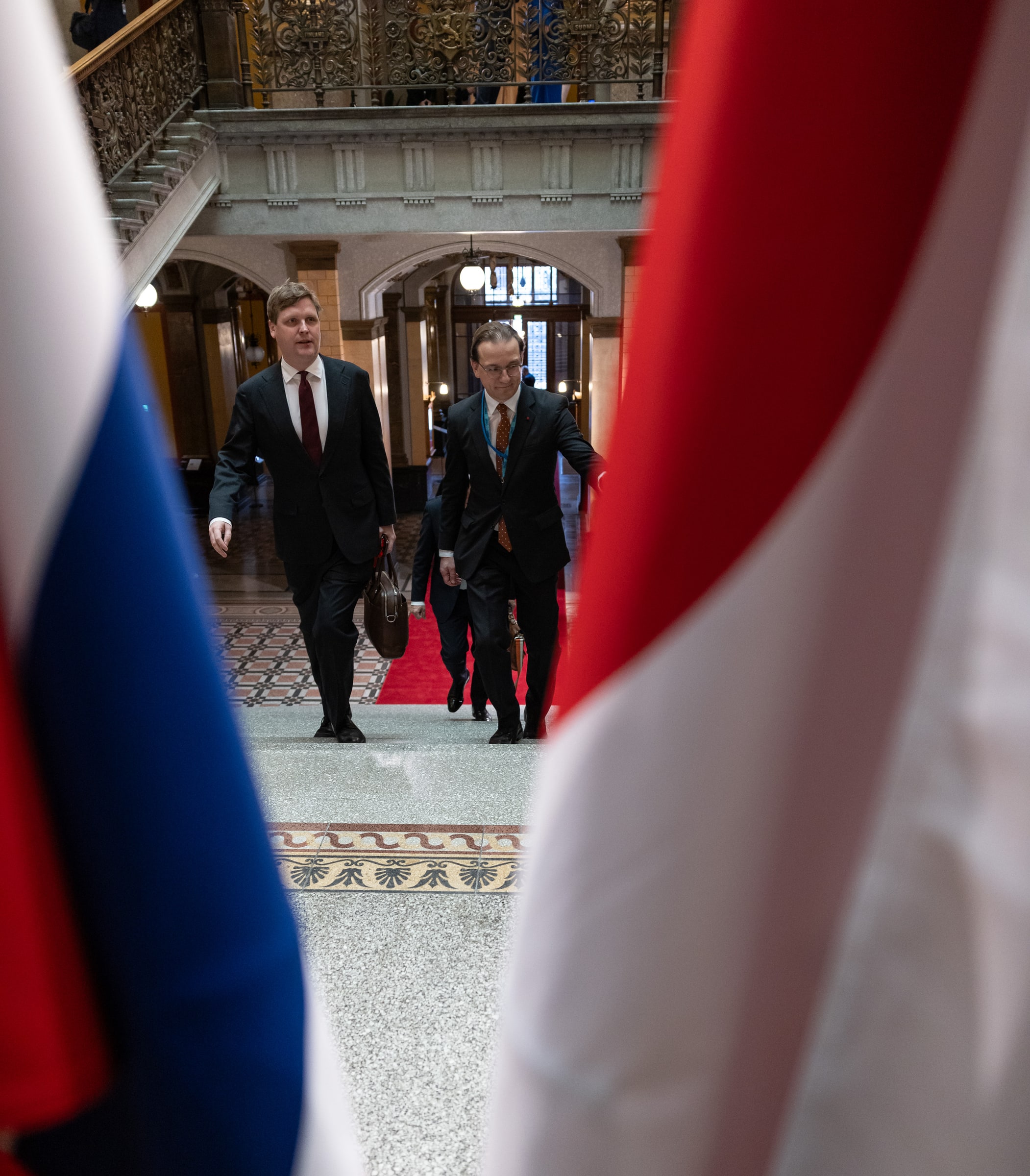 Ulf Kristersson, right, walking up stairs at the Nordic summit in Helsinki on 27 October 2026.
