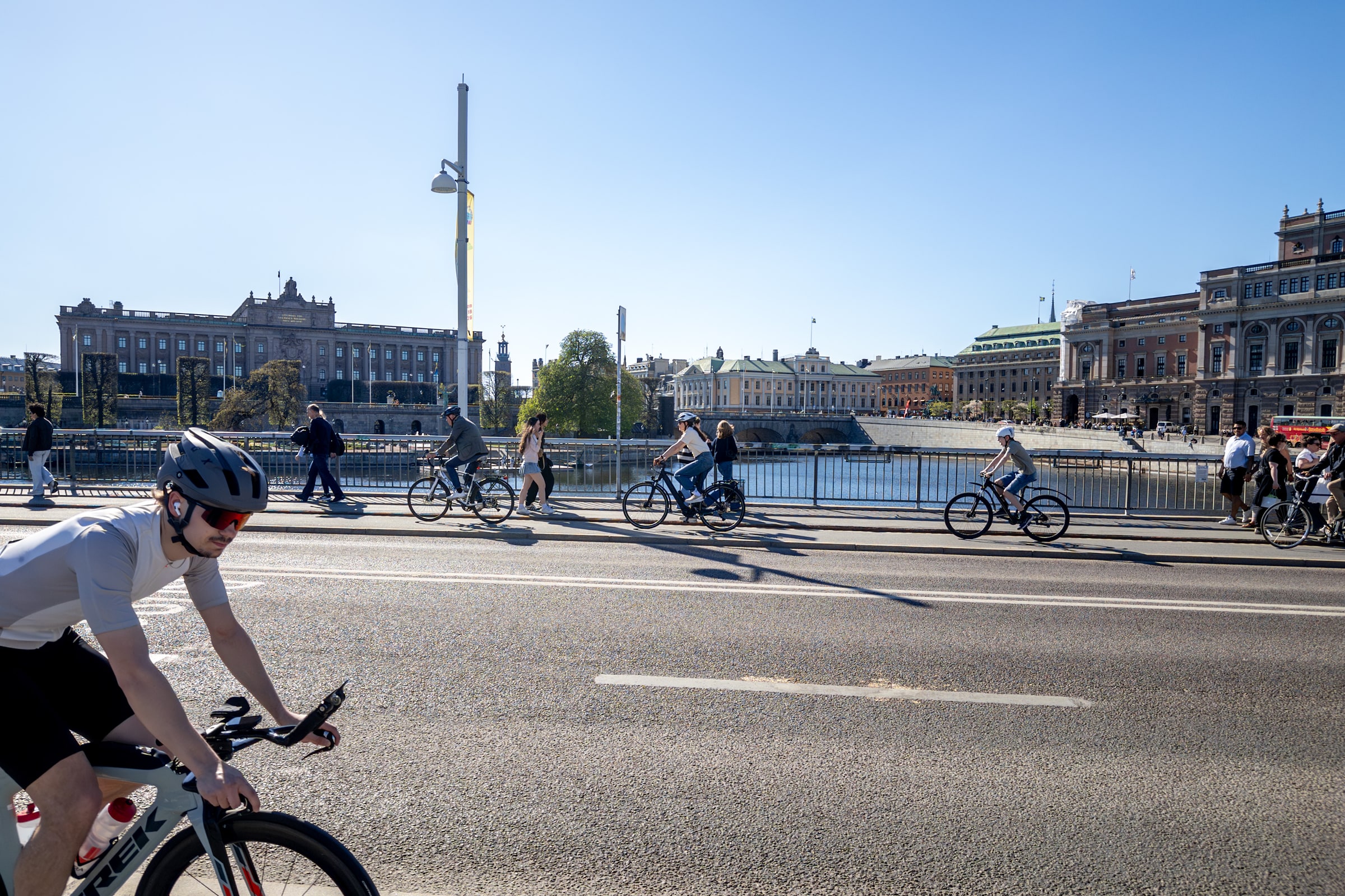 Cyclists ride across Strömbron in central Stockholm in May 2026.