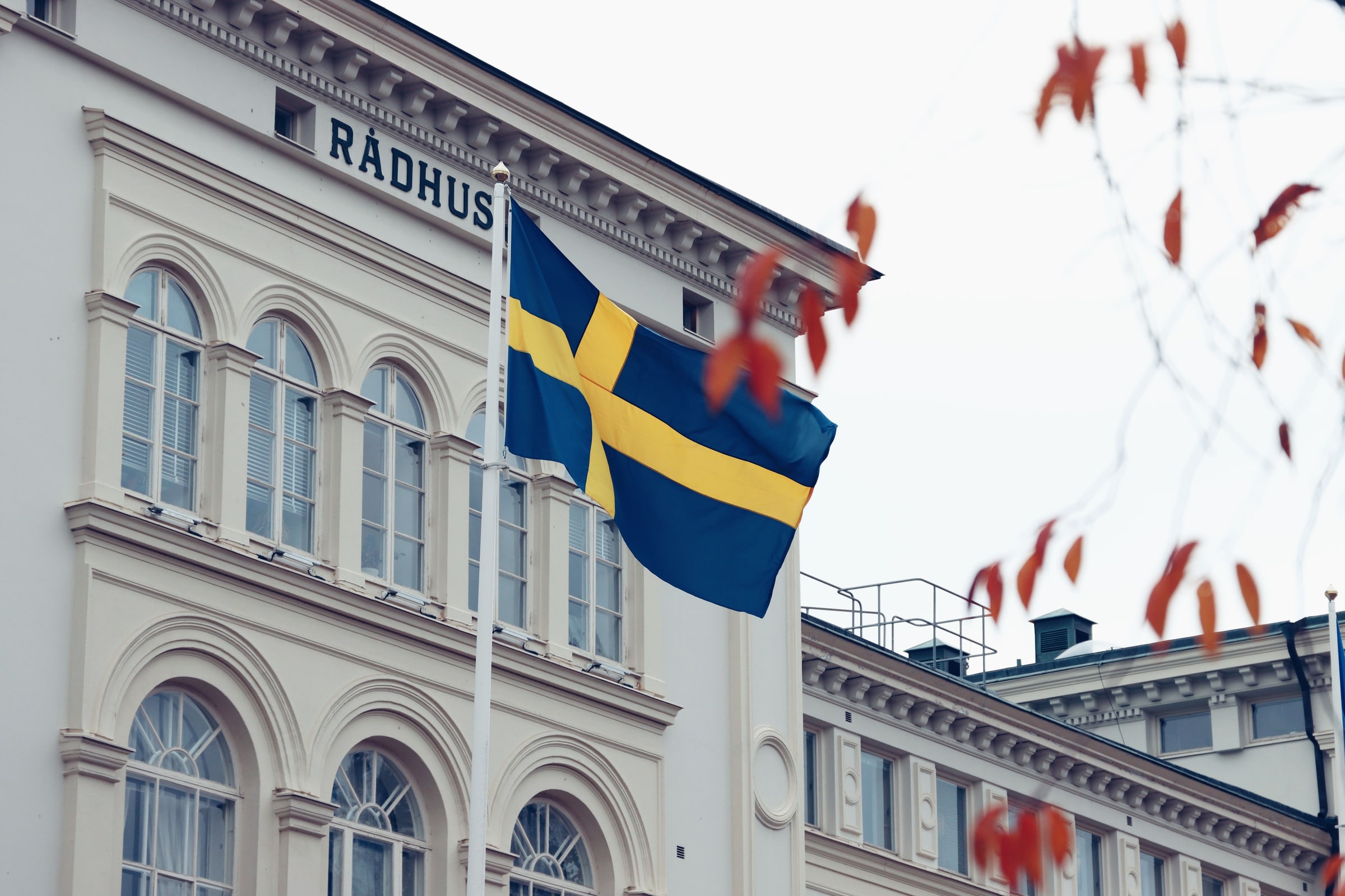 A Swedish flag flying outside the historic Radhus building in Jonkoping.