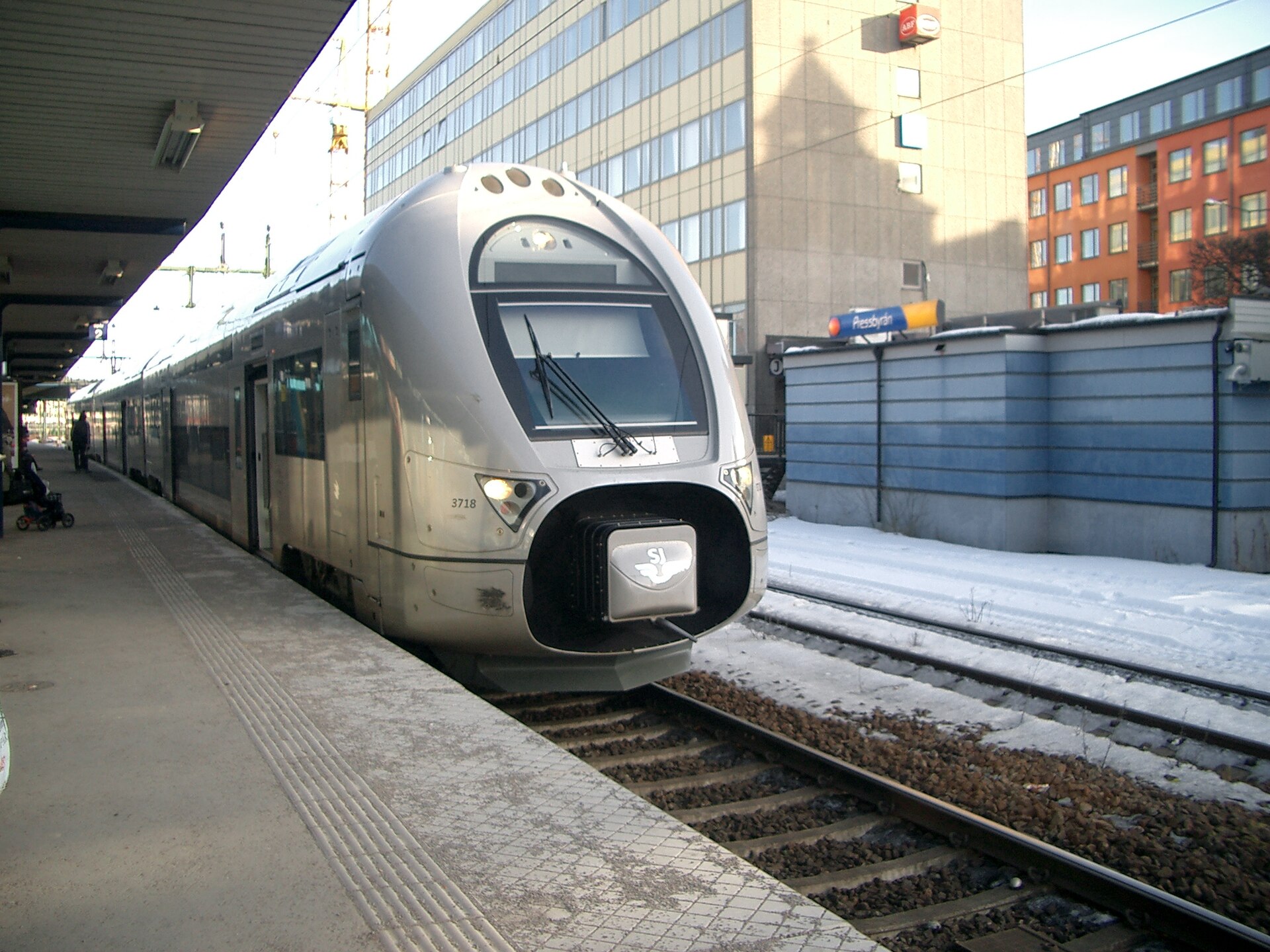 An SJ X40 regional double-decker train stands at Sundbyberg station in March 2006.
