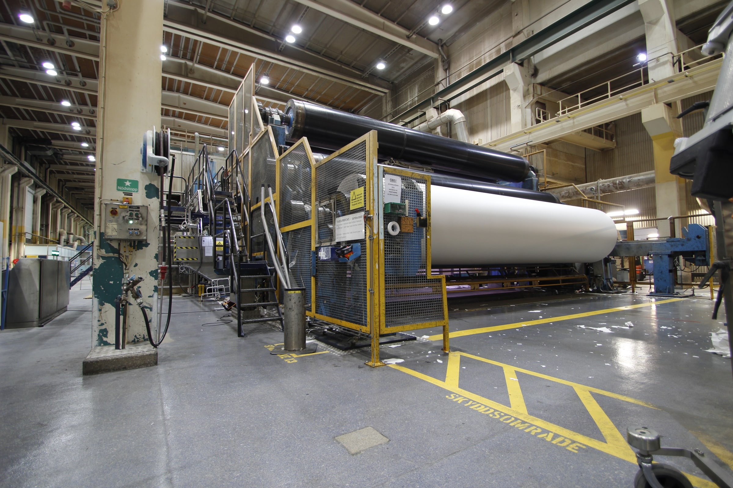 A paper reel and industrial machinery at Braviken mill in Norrköping, photographed in October 2014.