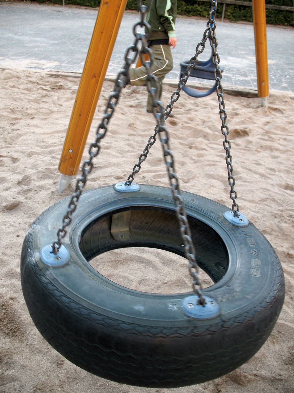 A tyre swing hanging at a public playground in Lund, Sweden.