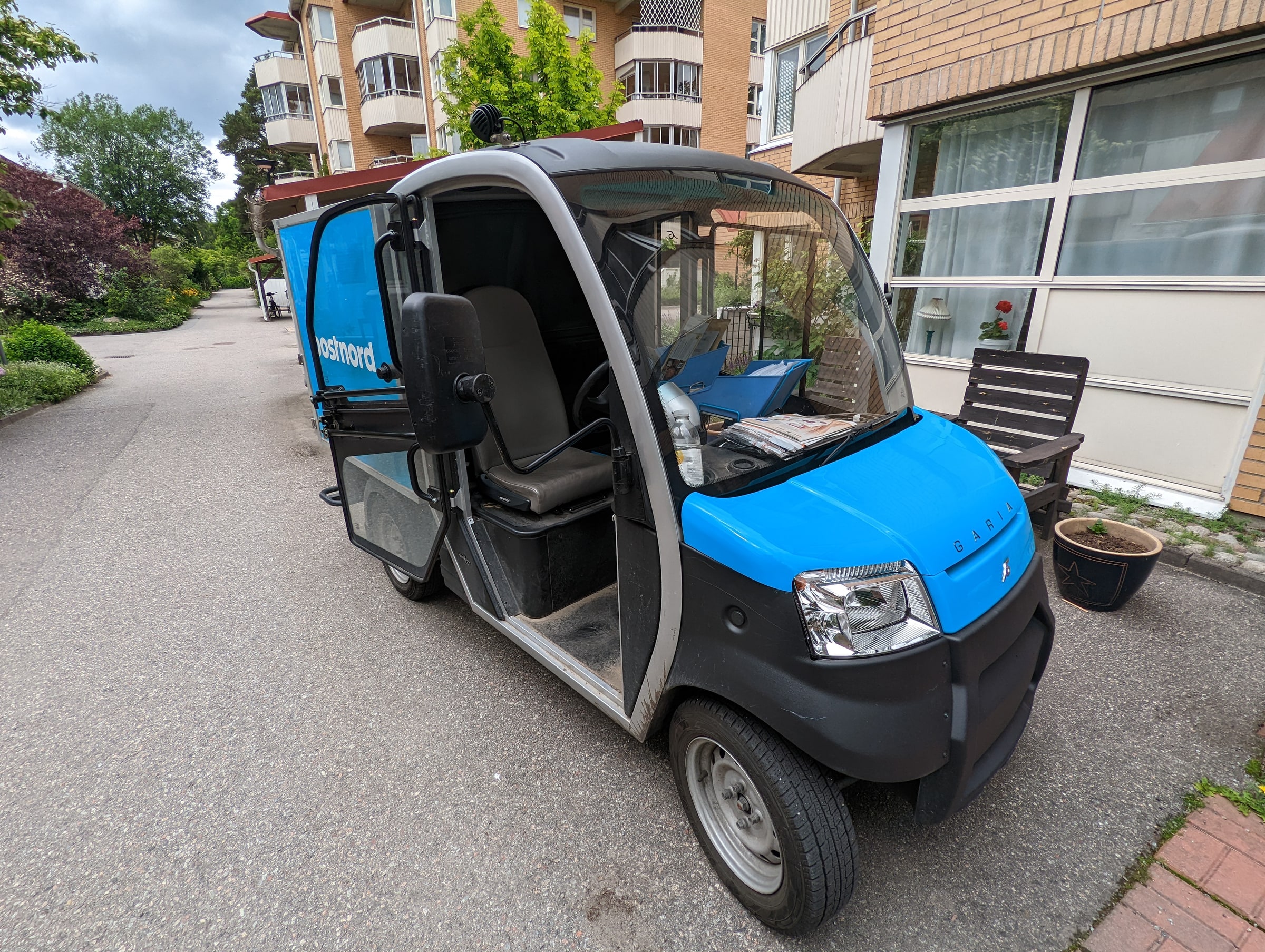 A PostNord delivery vehicle parked in Huddinge in June 2022, with mail visible inside.