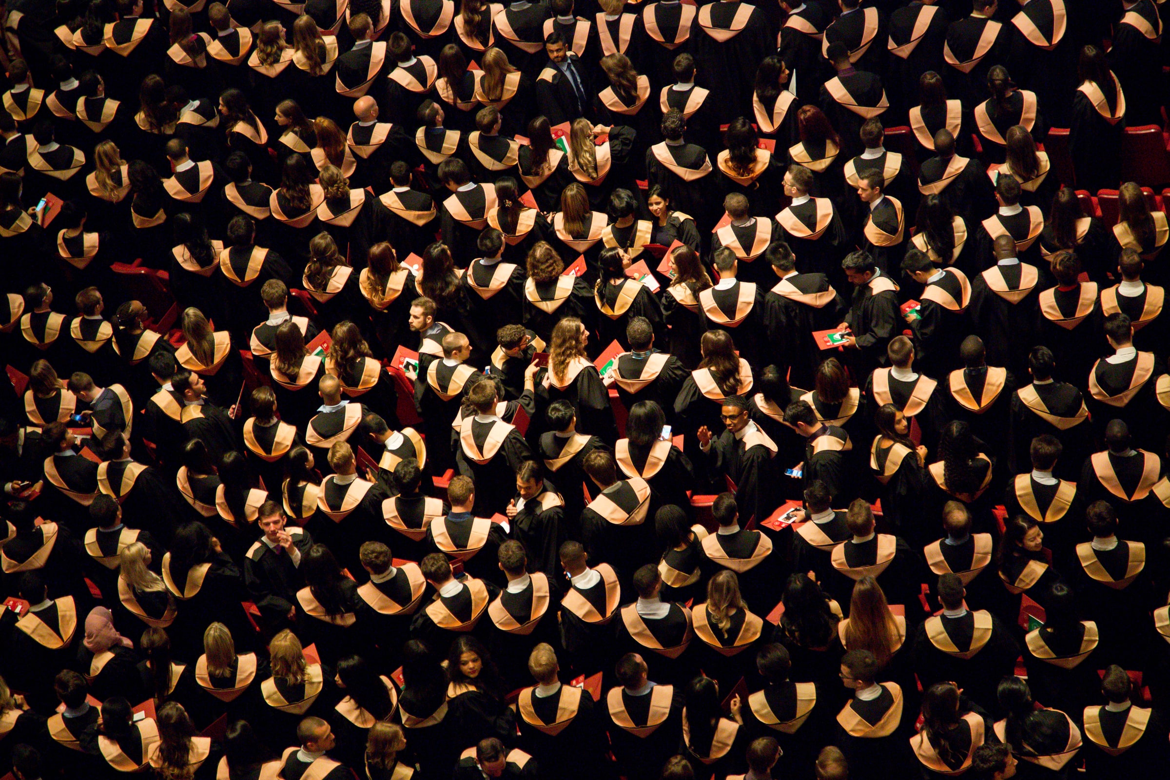 A large crowd of students at a university graduation ceremony in Ottawa.