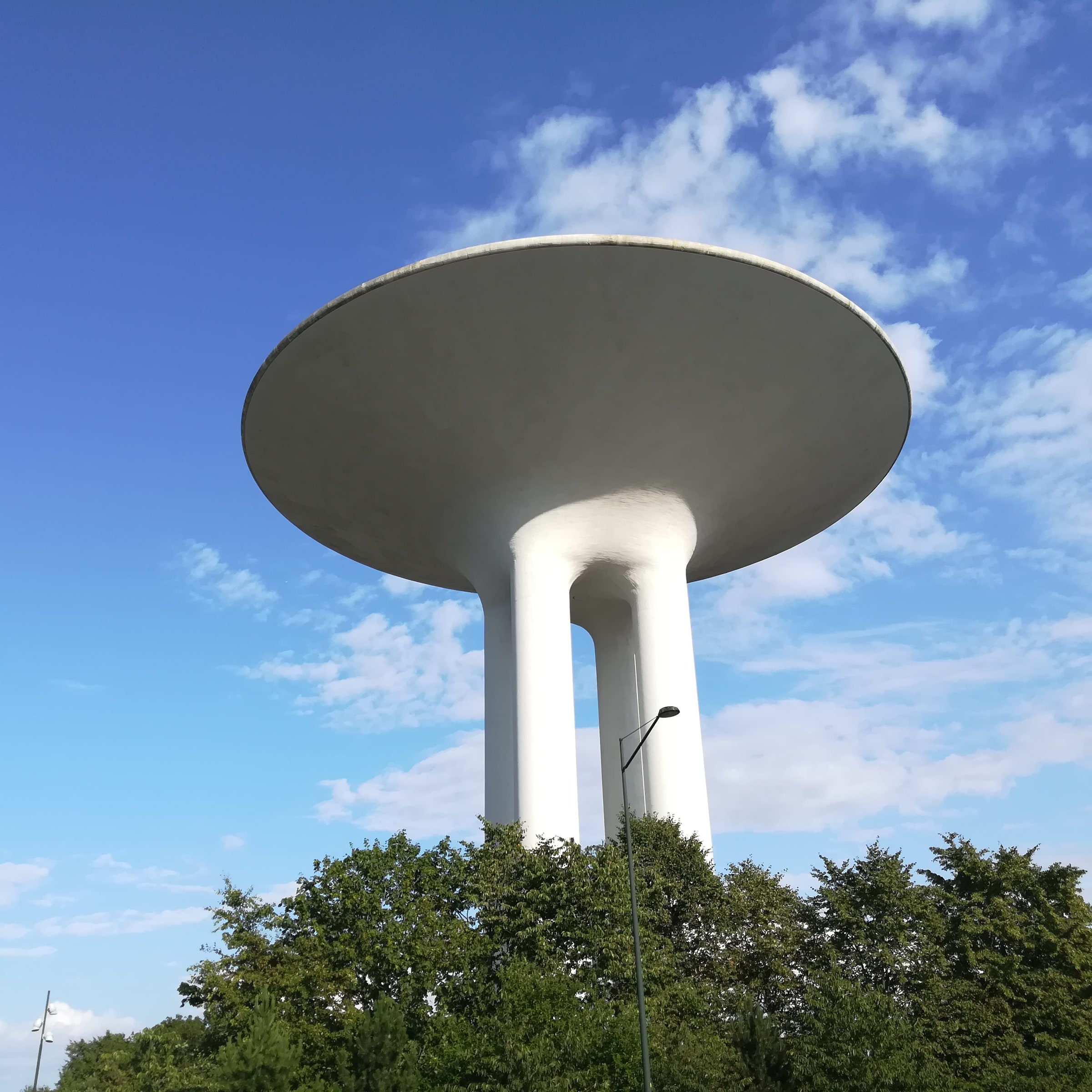 Hyllie water tower rises above summer trees in Malmö in an August 2019 file photograph.