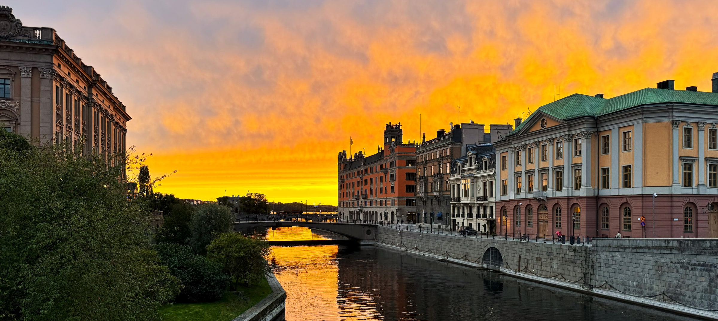 Government buildings including Rosenbad beside Norrström in Stockholm.