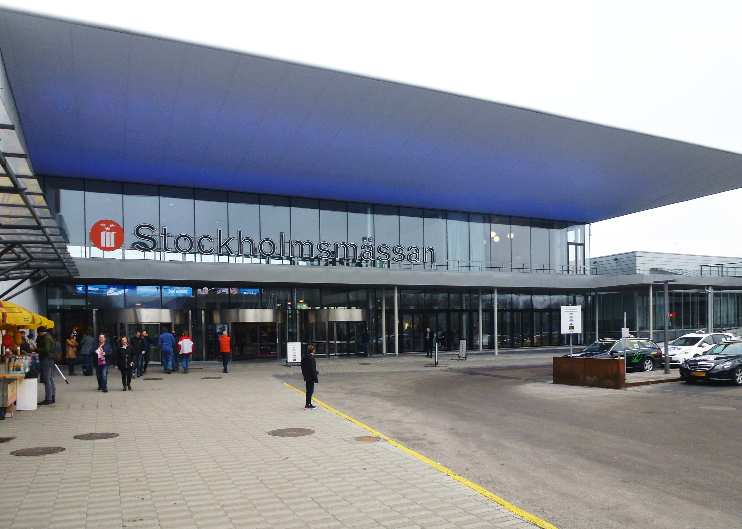 People approach the main entrance of Stockholmsmässan in a February 2015 file photograph.