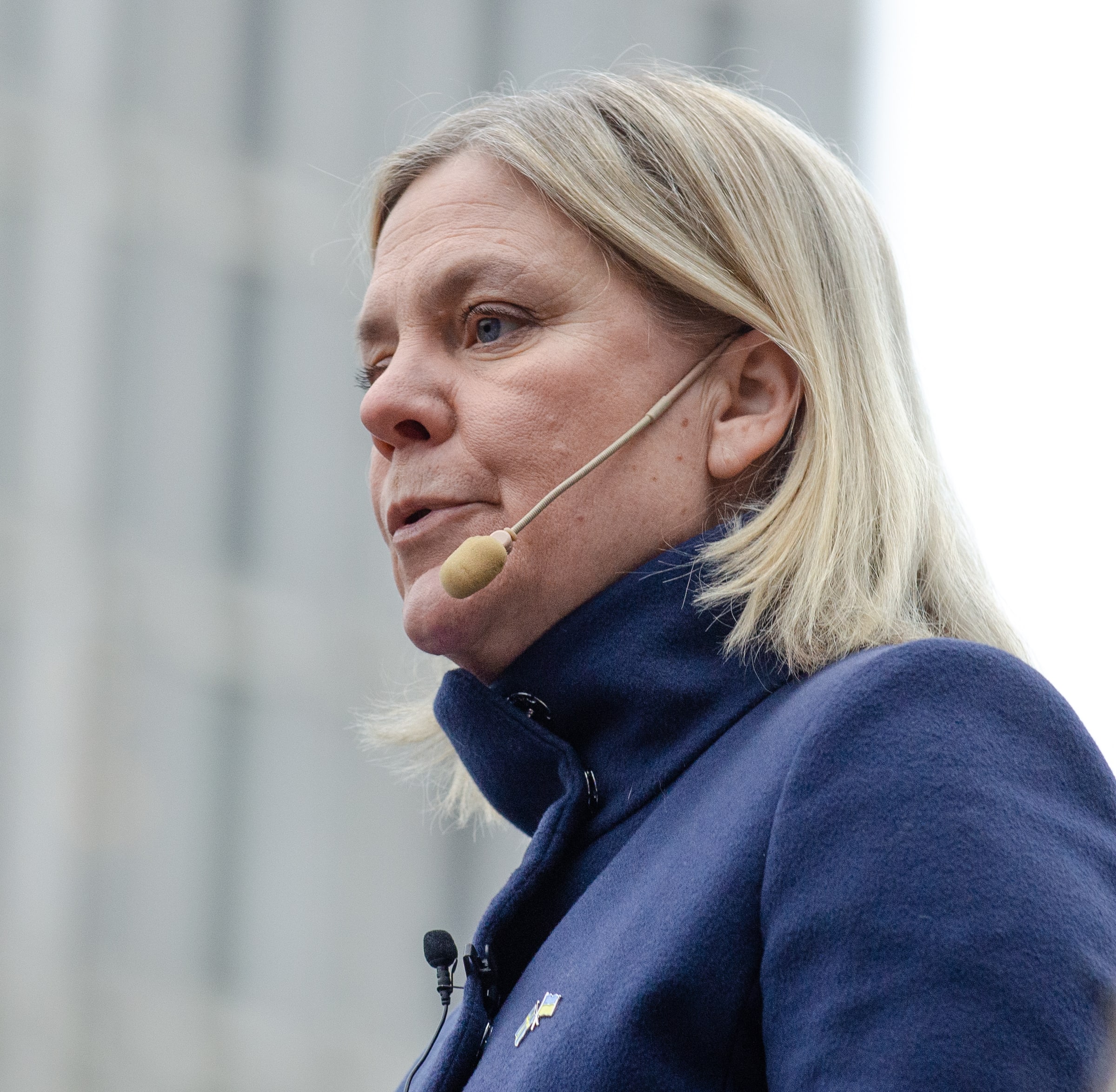 Magdalena Andersson speaks into a headset microphone in Stockholm on 24 February 2024.