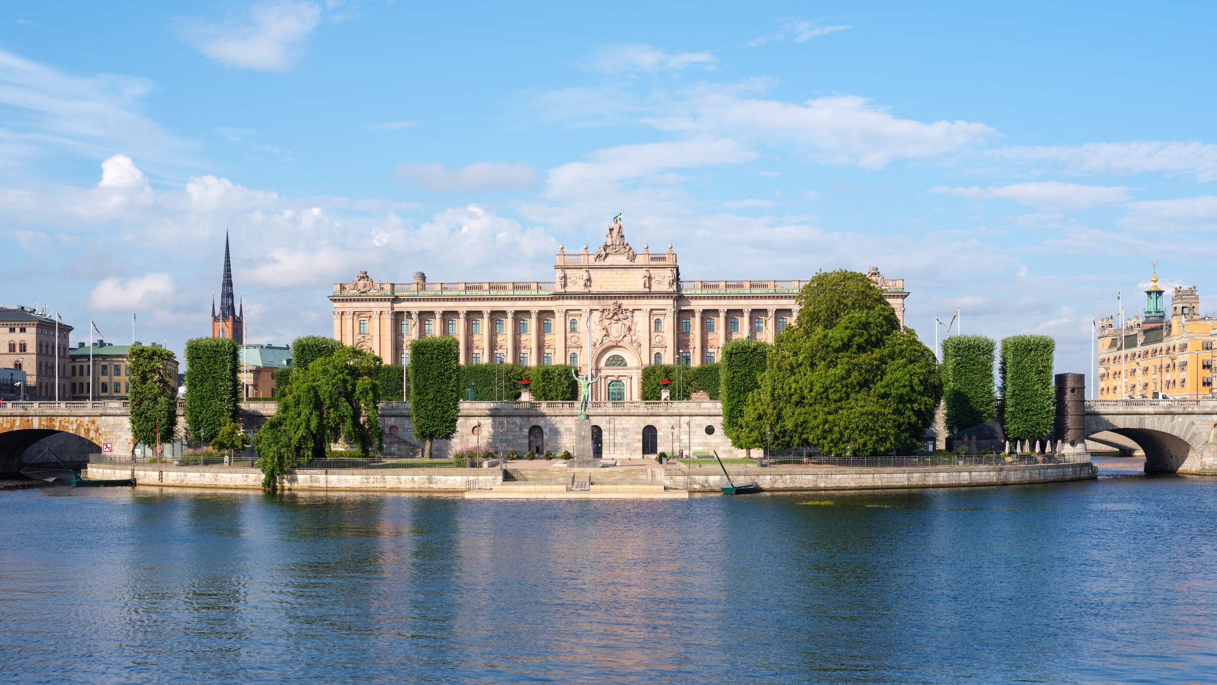 The east facade of Sweden’s Parliament building across the water in Stockholm.