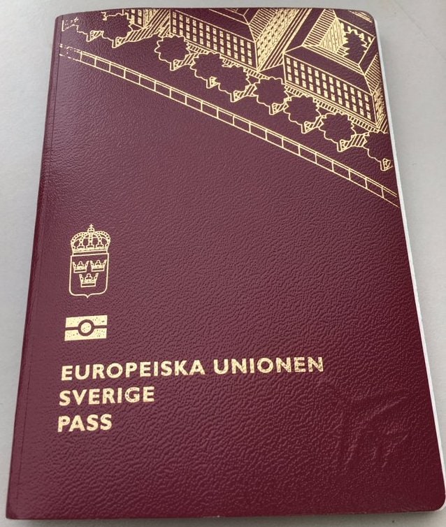 A Swedish passport photographed from above.