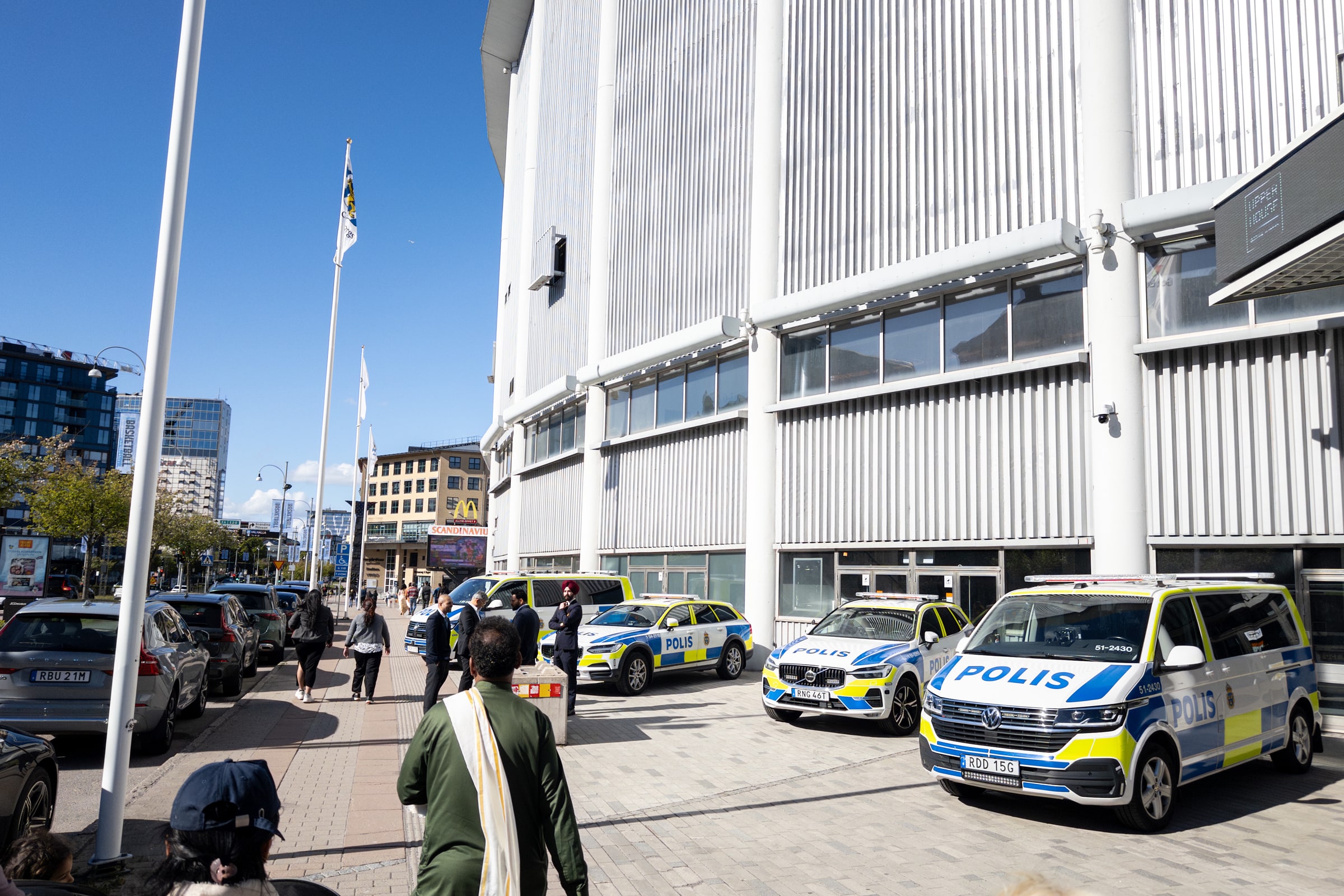 Police cars parked beside Scandinavium in Gothenburg.
