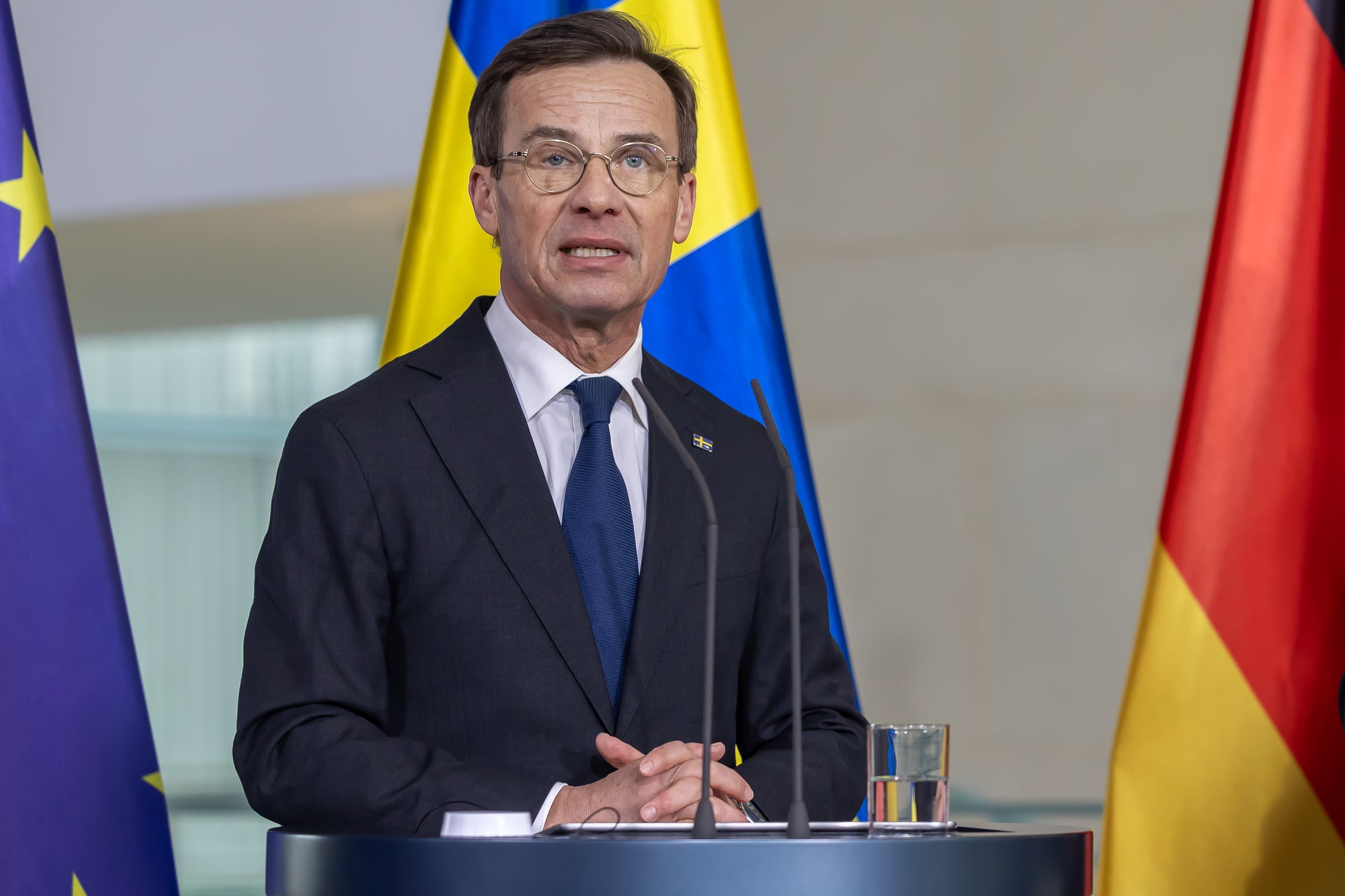 Ulf Kristersson speaking at a lectern in Berlin in January 2025.