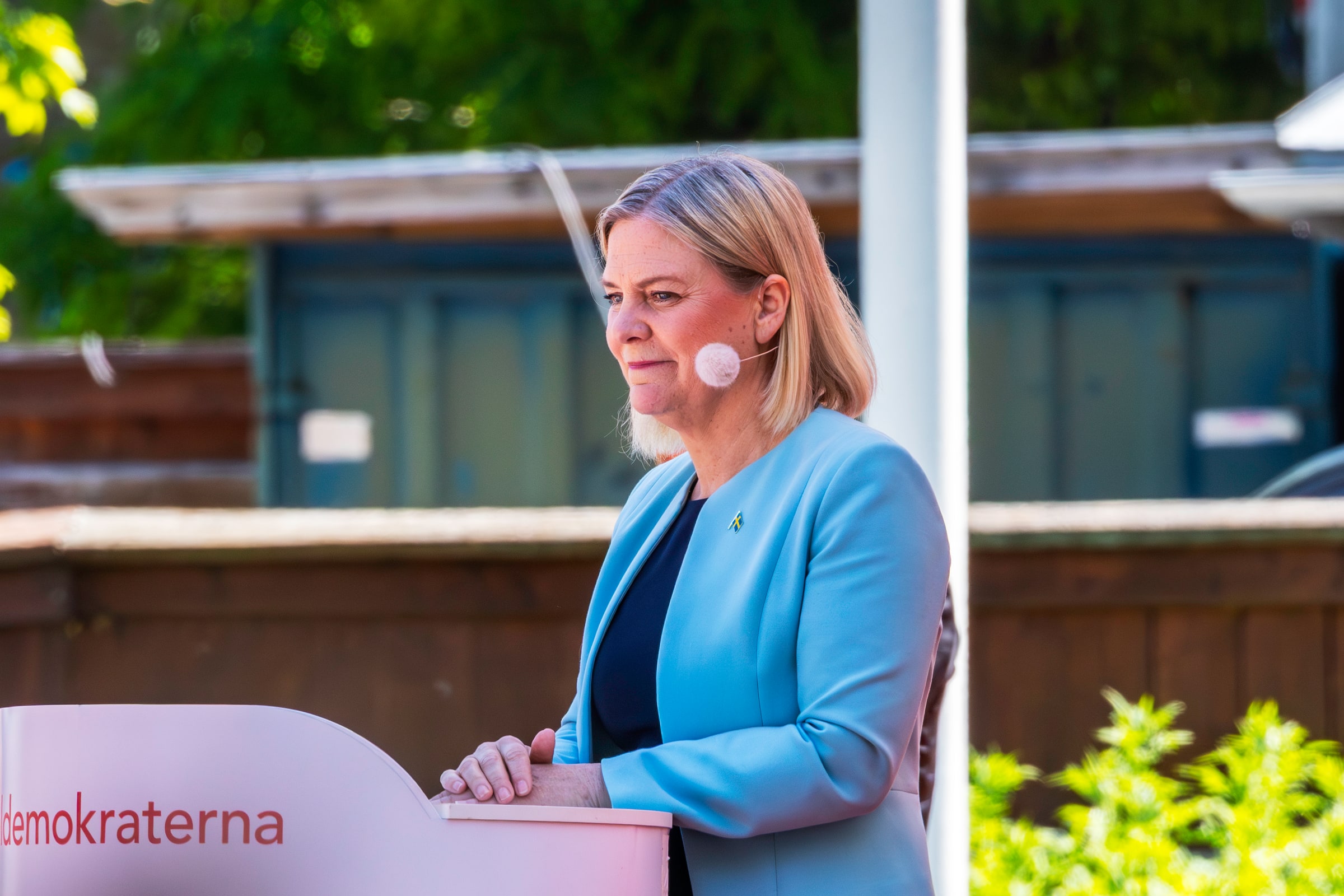 Magdalena Andersson speaks at a Social Democratic lectern during Almedalen Week in June 2025.