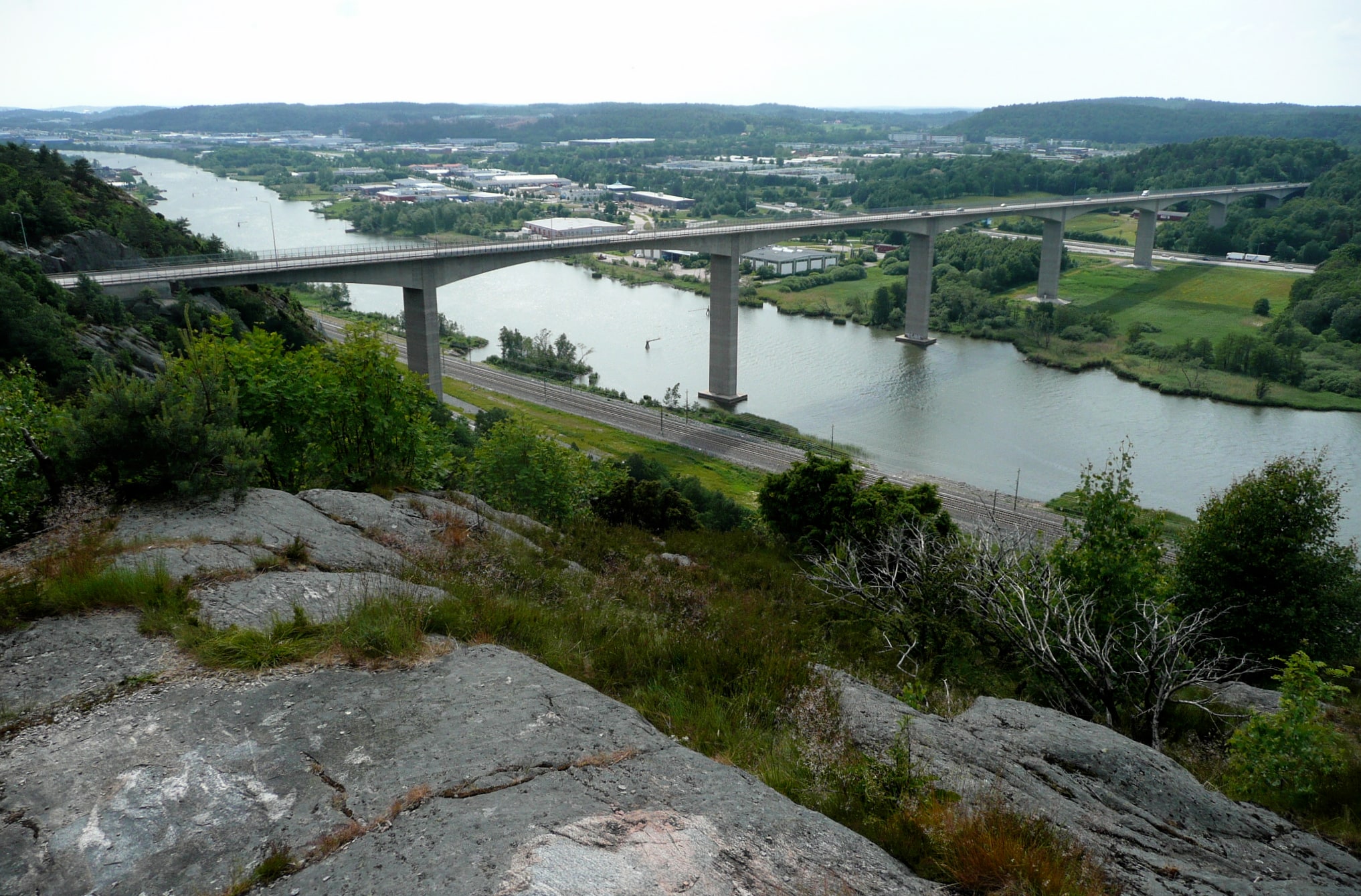 Angeredsbron crosses the Göta älv, viewed from Gårdstensberget.